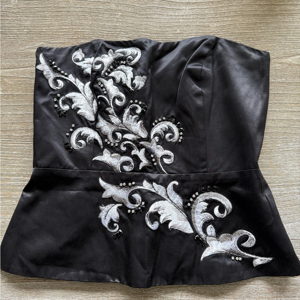 White House Black Market Black embellished corset top, size 4. Hidden zipper.
